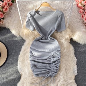 Small pleated short skirt with hips, feminine temperament, light mature style, puff sleeves, slim slimming round neck dress
