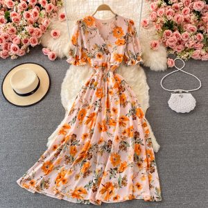 Summer new waist short-sleeved printed V-neck chiffon dress over the knee was thin popular puff sleeve large swing dress