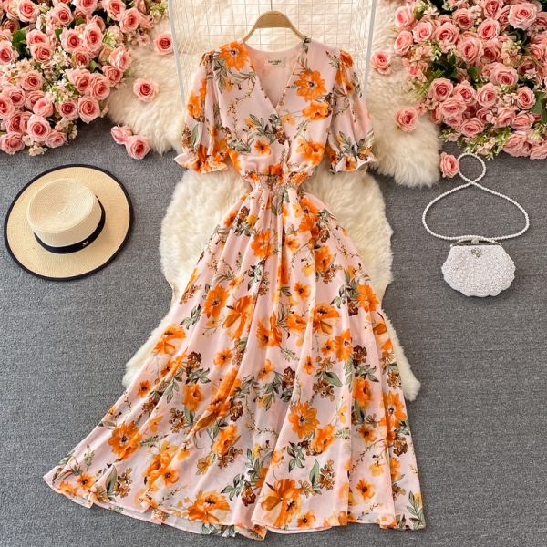 Summer new waist short-sleeved printed V-neck chiffon dress over the knee was thin popular puff sleeve large swing dress